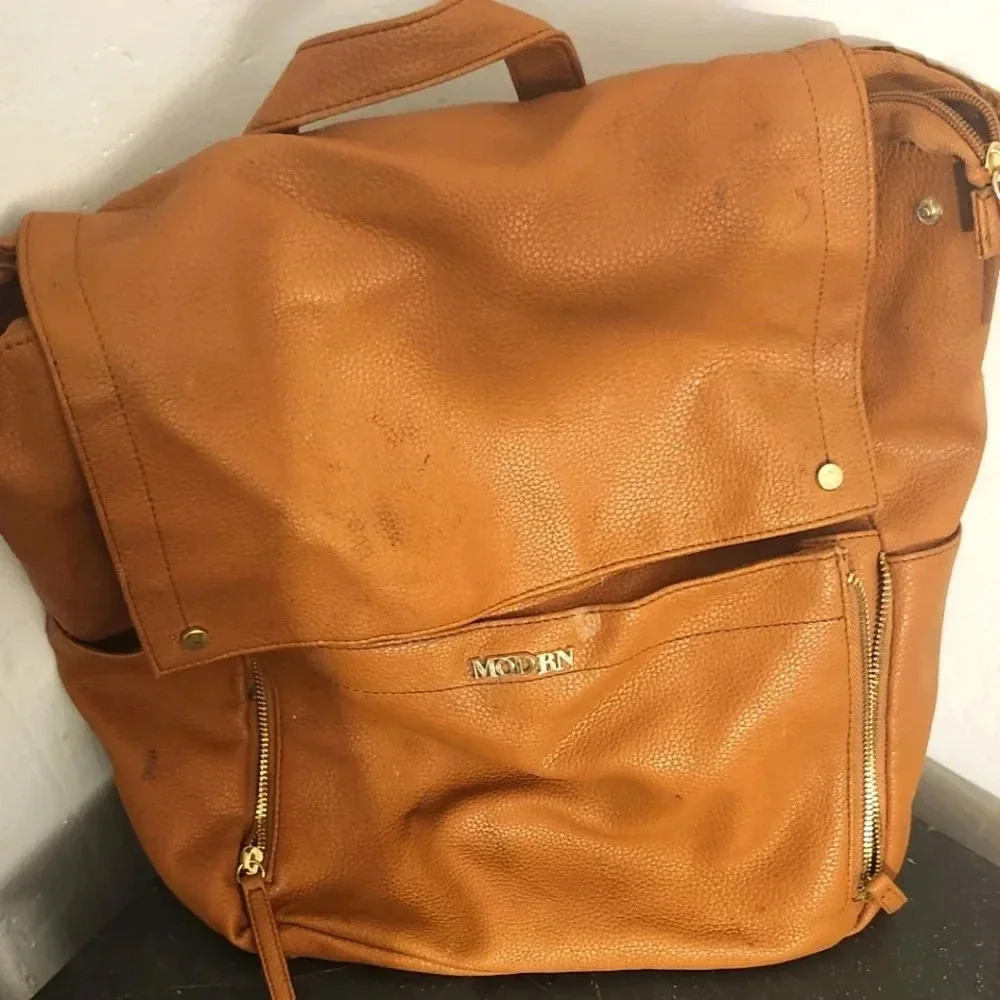 Never used Women's optional backpack/purse/diaper bag